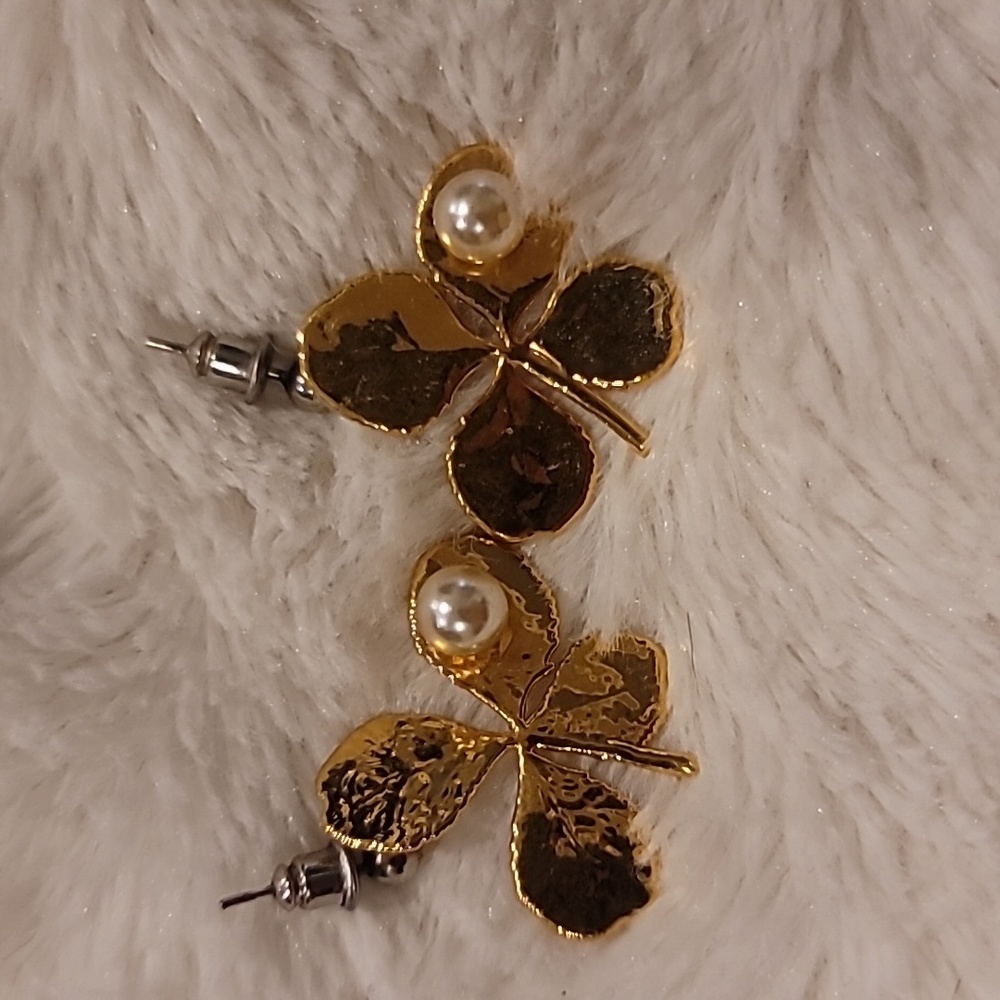 Beautifully shiny and gold four leaf clover earrings